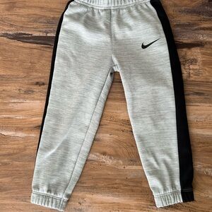 Nike Kids Light Gray Joggers with Black Stripes